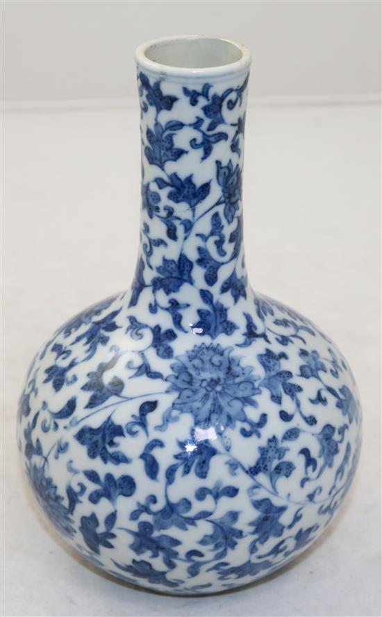 A Chinese blue and white lotus bottle vase, Yongzheng mark, 19th century, 21cm, neck restored